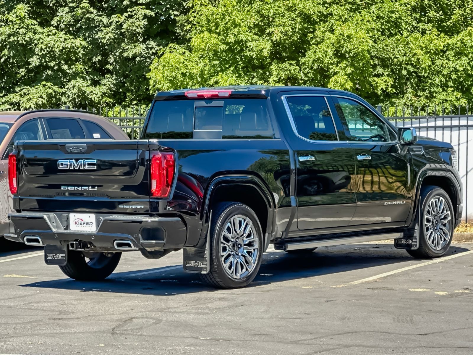 Used 2024 Black GMC Denali Ultimate image 3