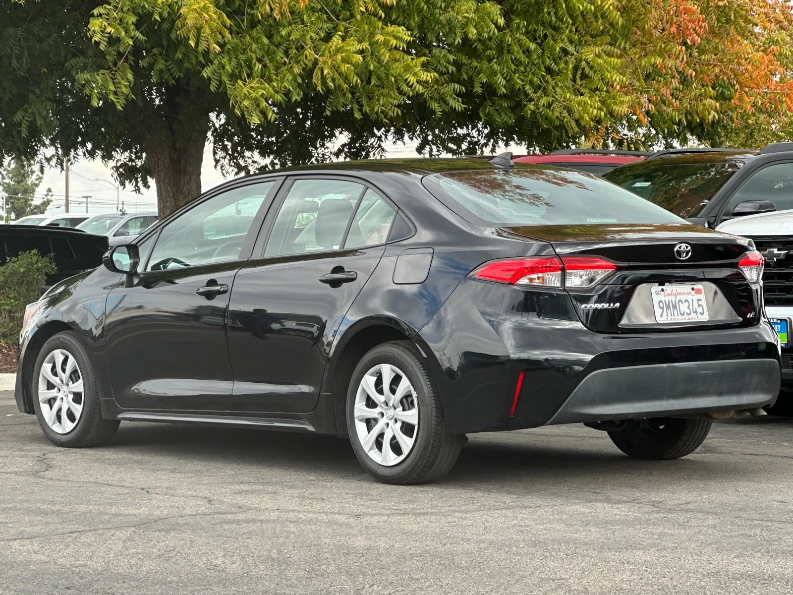 Used 2024 Black Toyota LE image 6