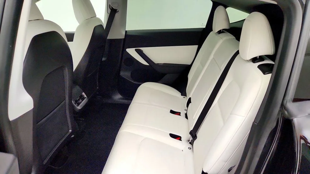 Used 2021 Solid Black Tesla Performance AWD w/ White & Black Premium Interior image 24