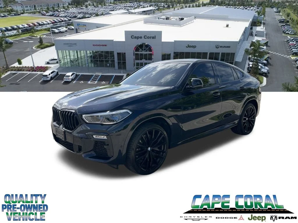 Used 2020 Black BMW M50i image 1