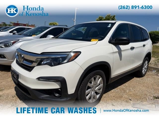 Used 2019 White Diamond Pearl Honda LX image 1