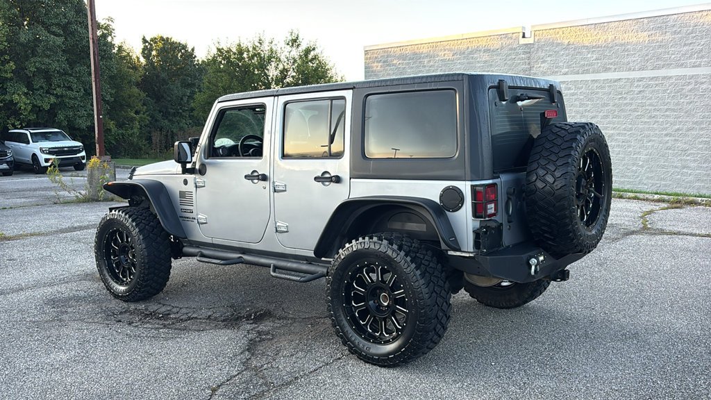 Used 2013 Billet Clearcoat Metallic Jeep Unlimited Sport image 5