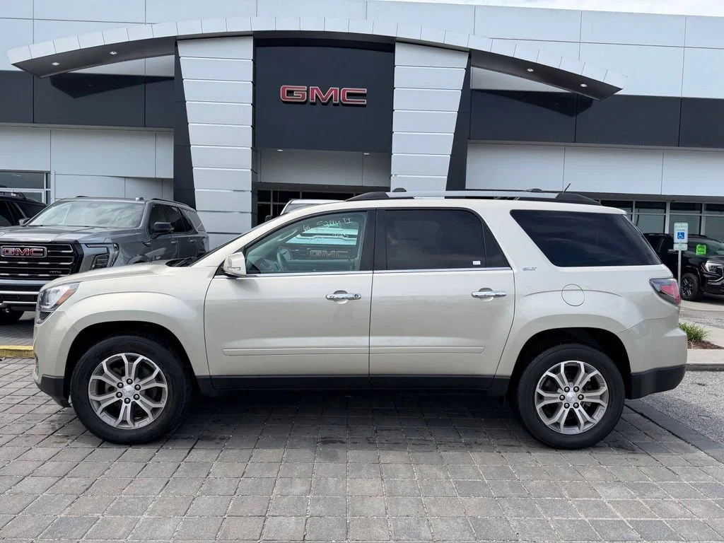 Used 2013 Champagne Silver Metallic GMC SLT image 1