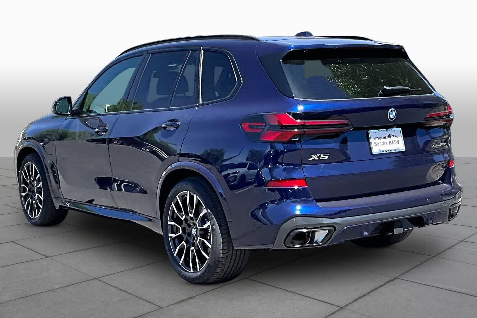 New 2026 Tanzanite Blue II Metallic BMW xDrive50e image 12