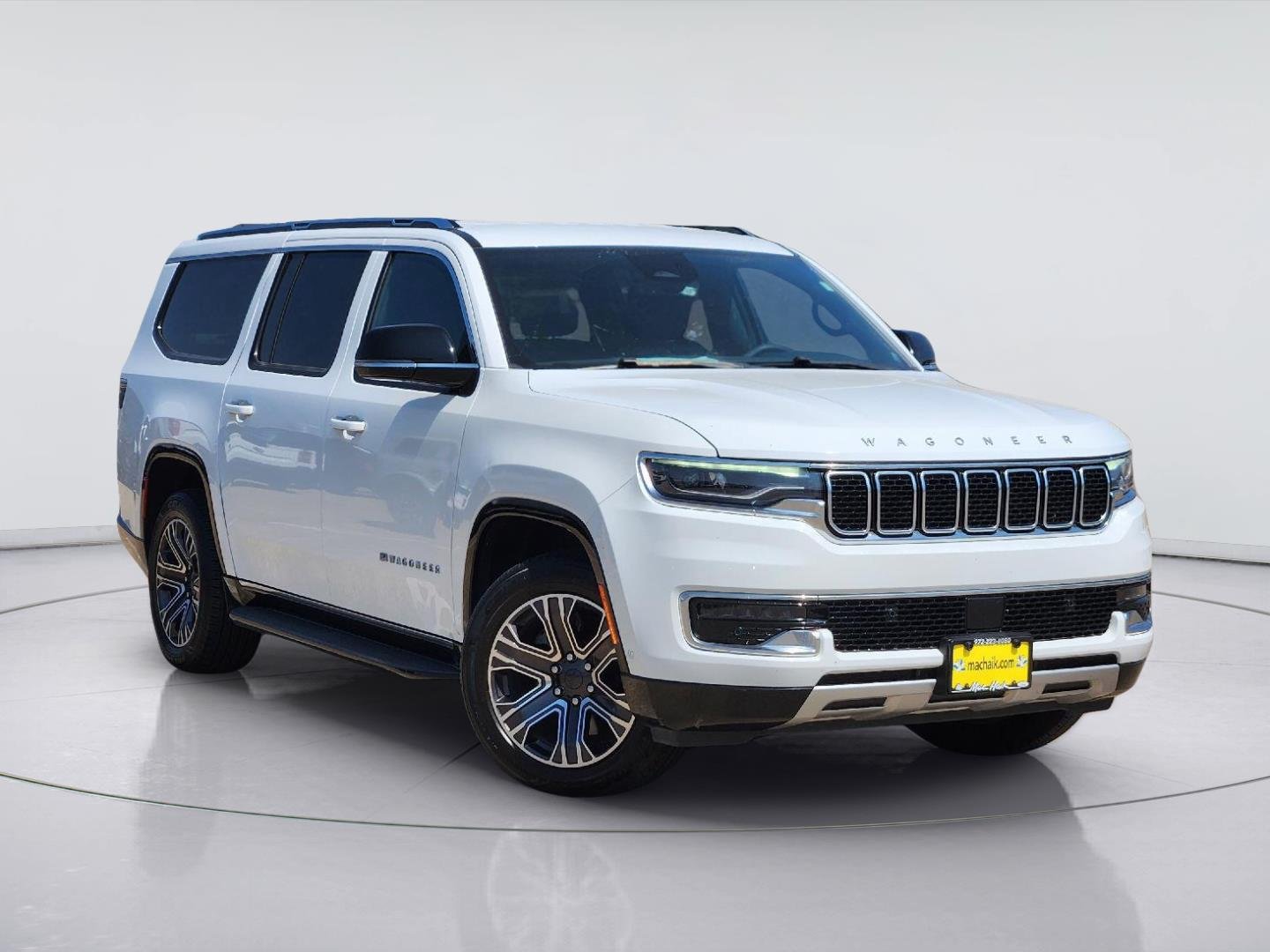 Used 2024 Bright White Clearcoat Jeep Series II image 1