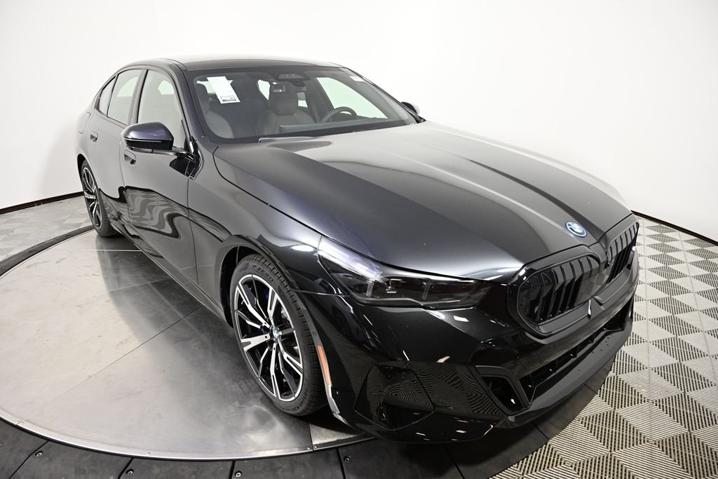 New 2027 Black Sapphire Metallic BMW 550e xDrive image 7