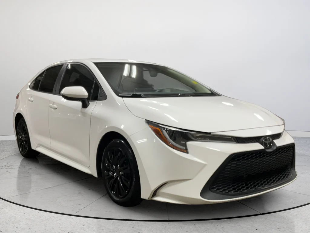 Used 2021 White Toyota LE image 1