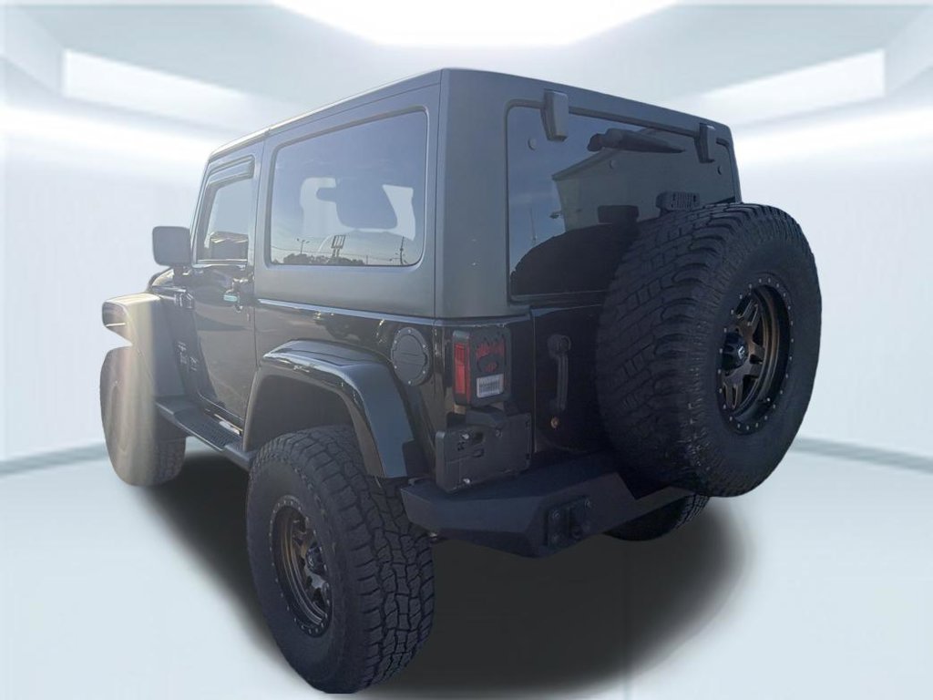 Used 2015 Black Clearcoat Jeep Sahara image 14