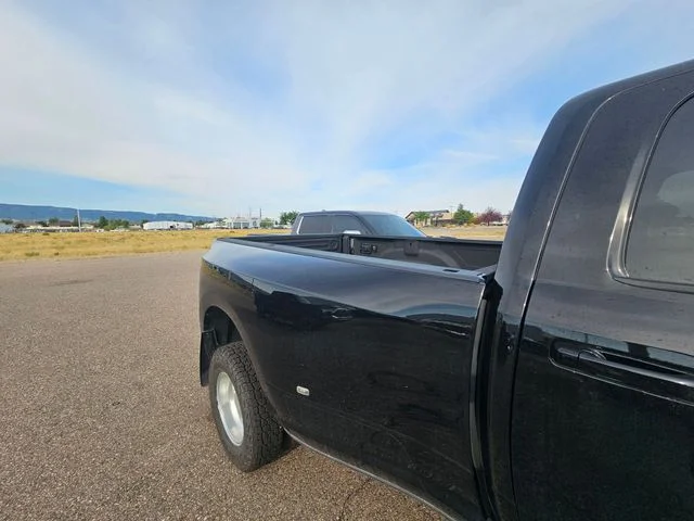 Used 2024 Diamond Black Ram Laramie image 8