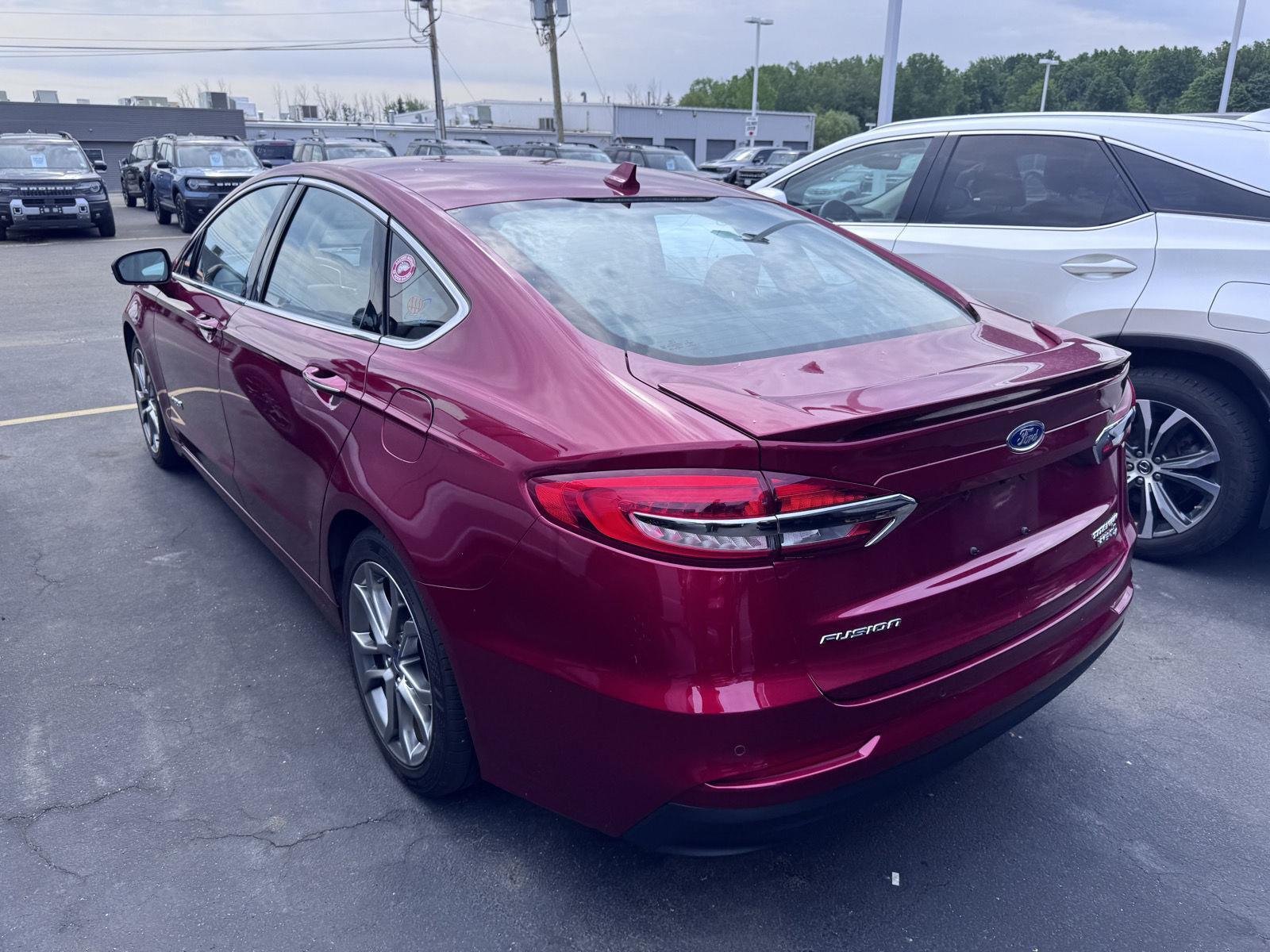 Used 2019 Ruby Red Metallic Tinted Clearcoat Ford Titanium image 6