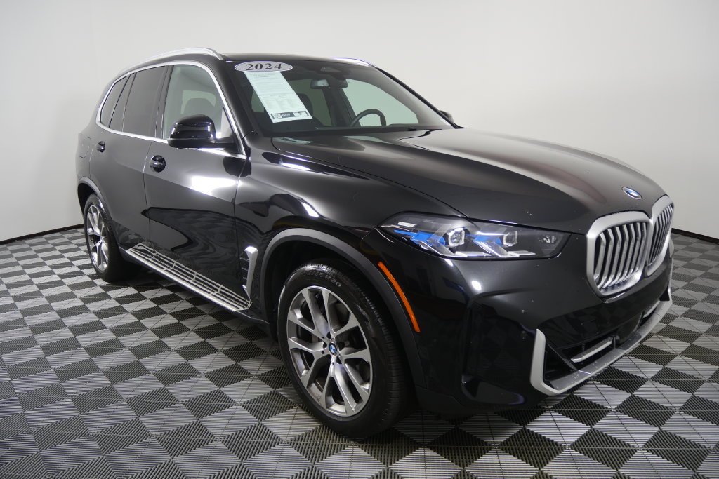 Certified Used 2024 Black Sapphire Metallic BMW sDrive40i image 2