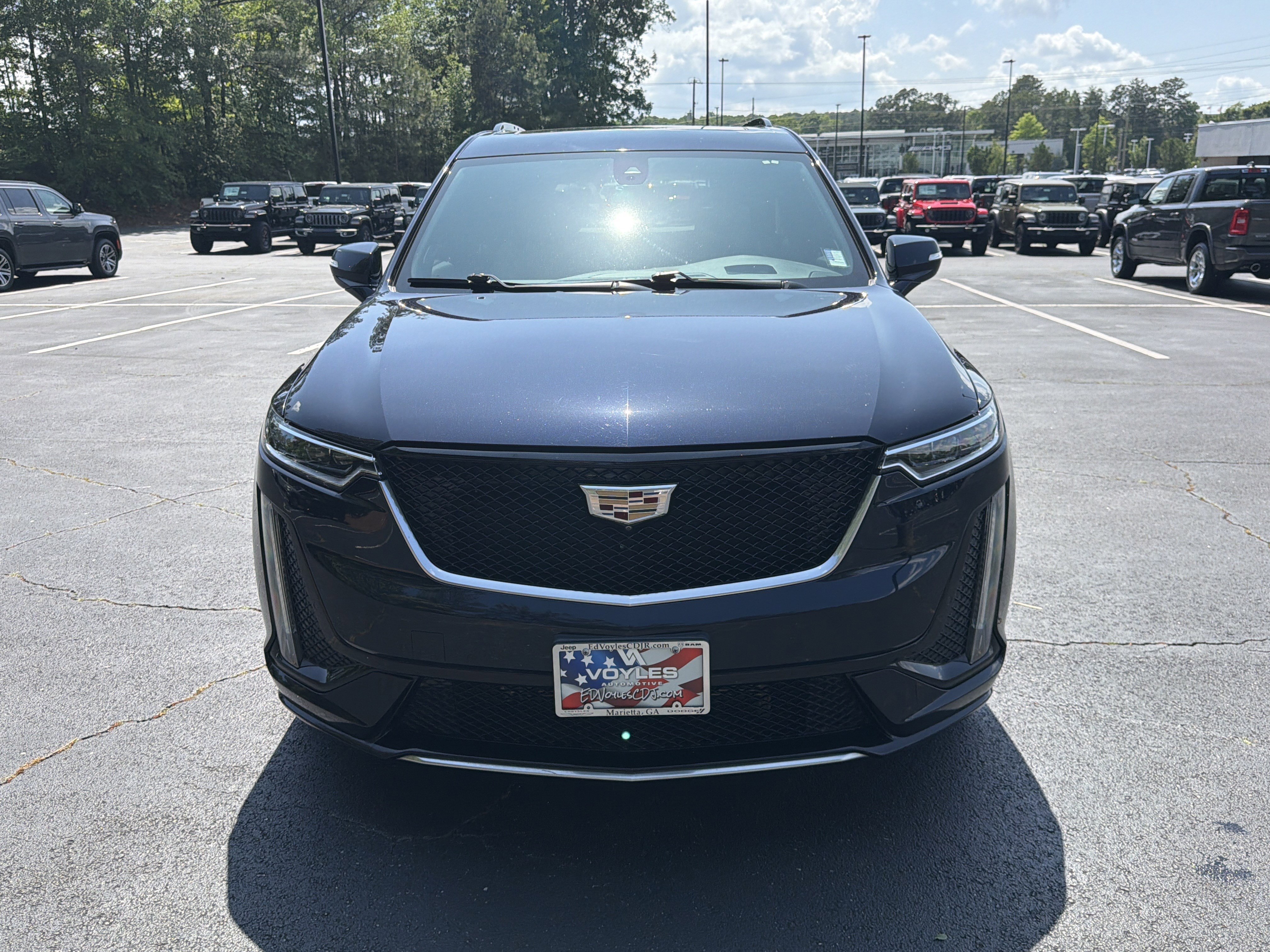 Used 2021 Dark Moon Blue Metallic Cadillac Sport image 2