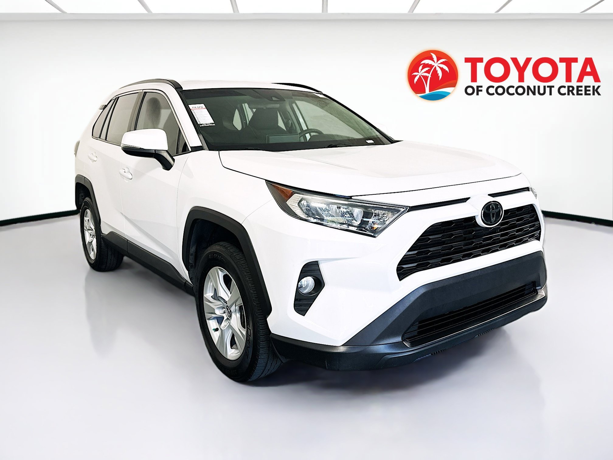 Used 2021 Super White Toyota XLE image 1