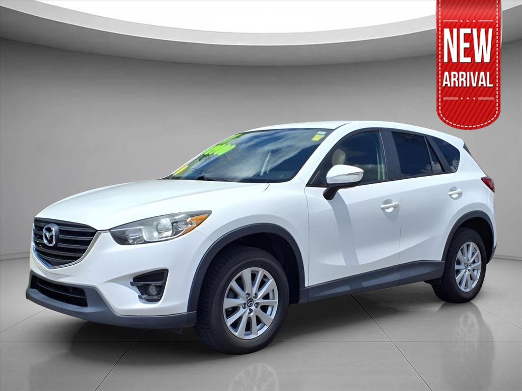 Used 2016 Crystal White Pearl Mica Mazda Touring image 1