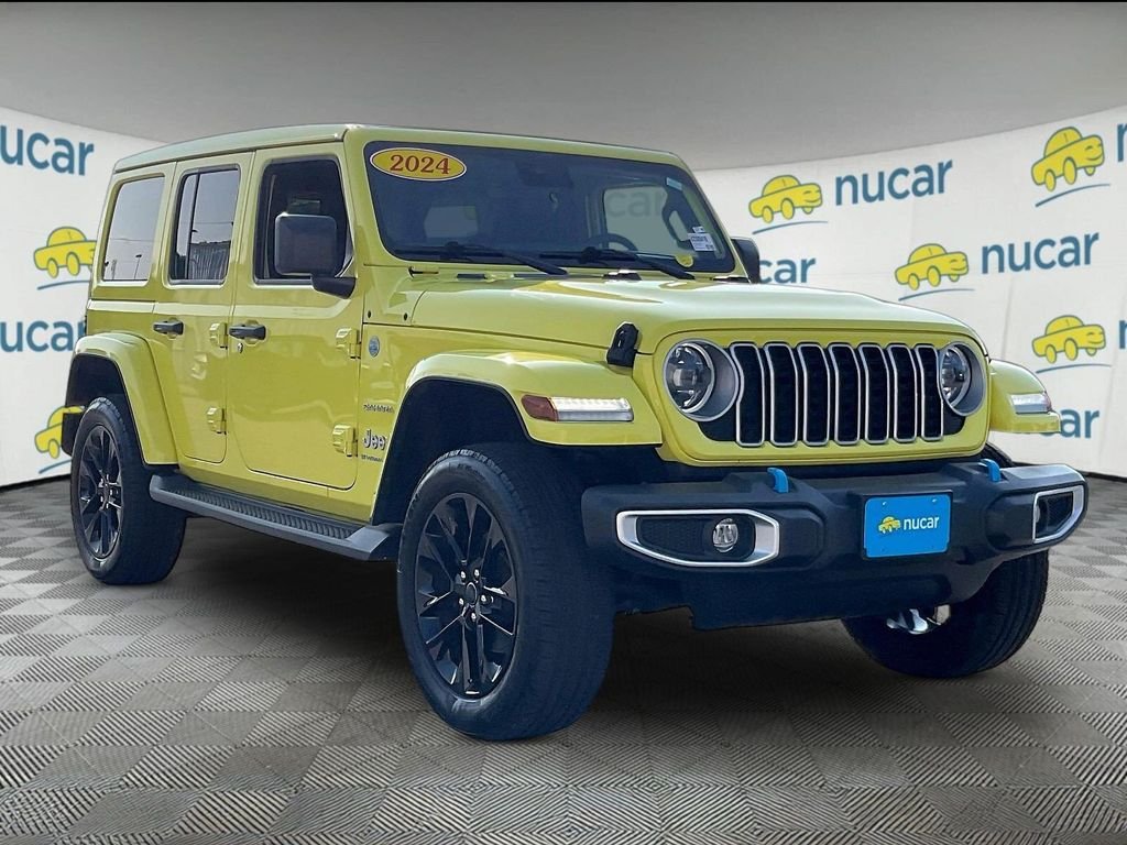 Used 2024 Yellow Jeep Sahara 4xe image 1