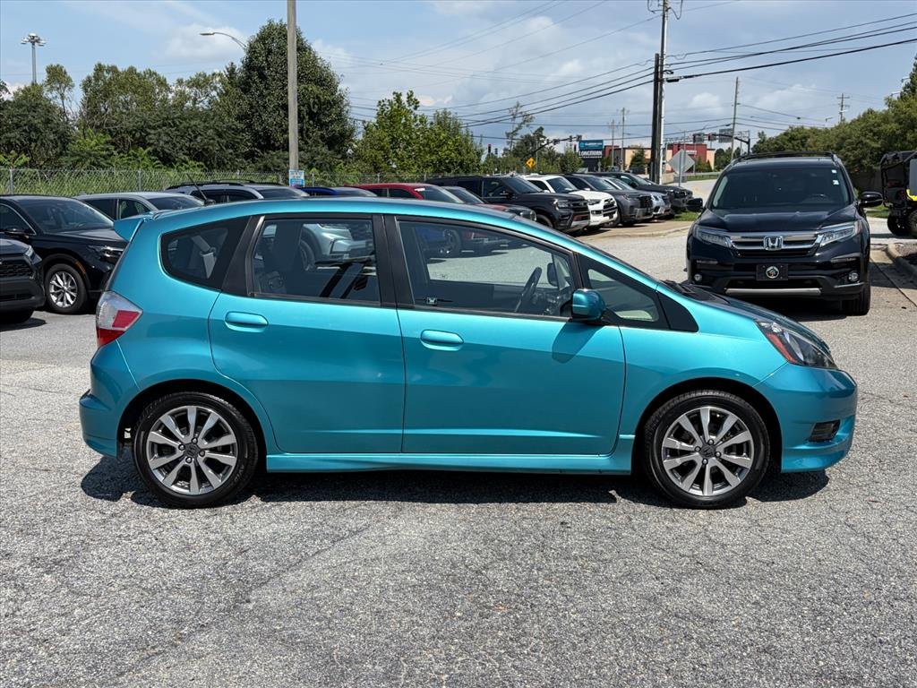 Used 2013 Blue Raspberry Metallic Honda Sport image 3