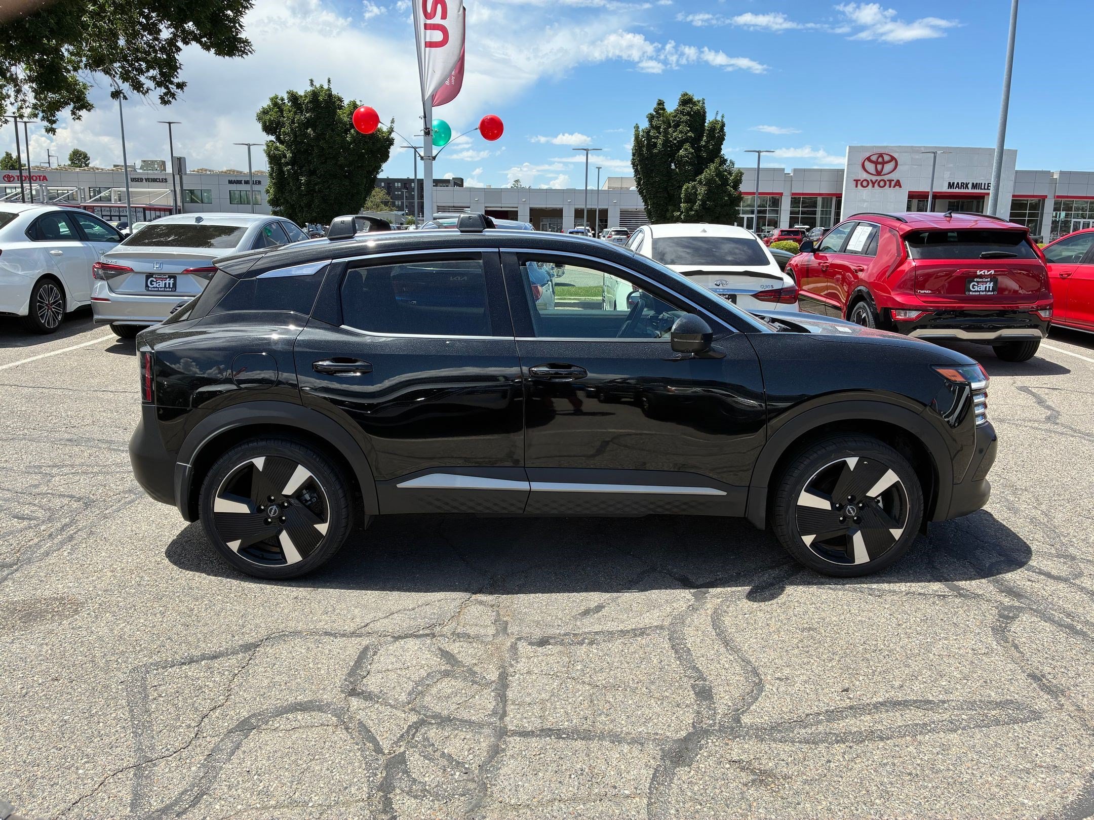 Certified Used 2025 Super Black Nissan SR image 2