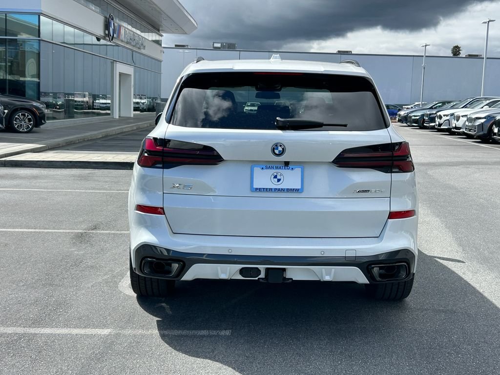 New 2026 Mineral White Metallic BMW xDrive50e image 4