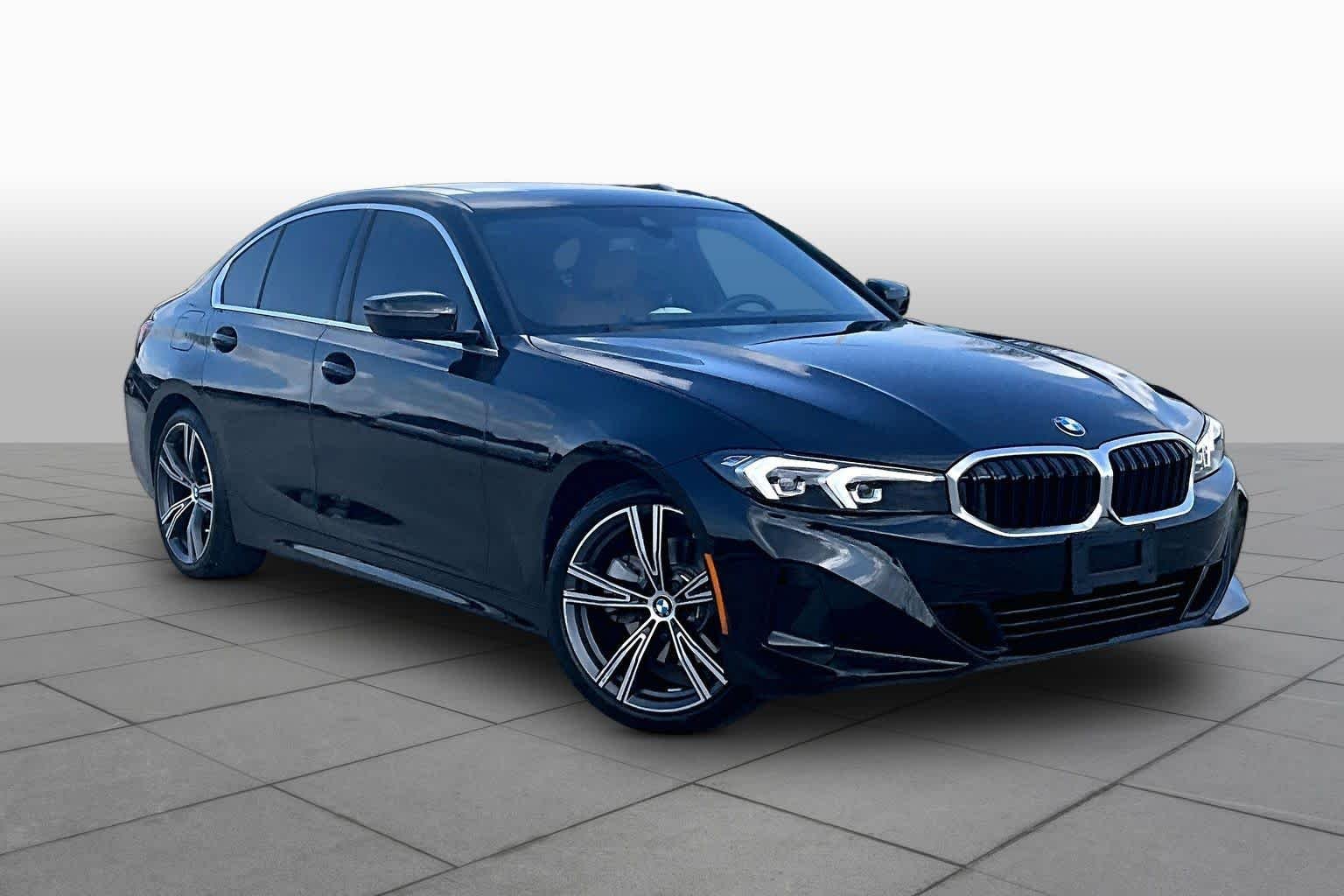 Used 2024 Black Sapphire Metallic BMW 330i image 2