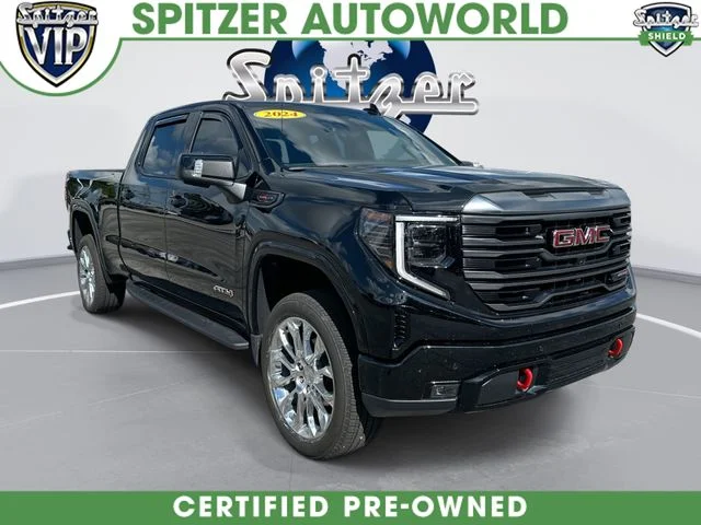 Used 2024 Black GMC AT4 image 1