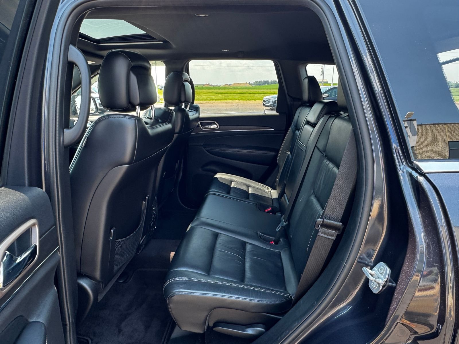 Used 2016 Steel Metallic JEEP Limited image 12