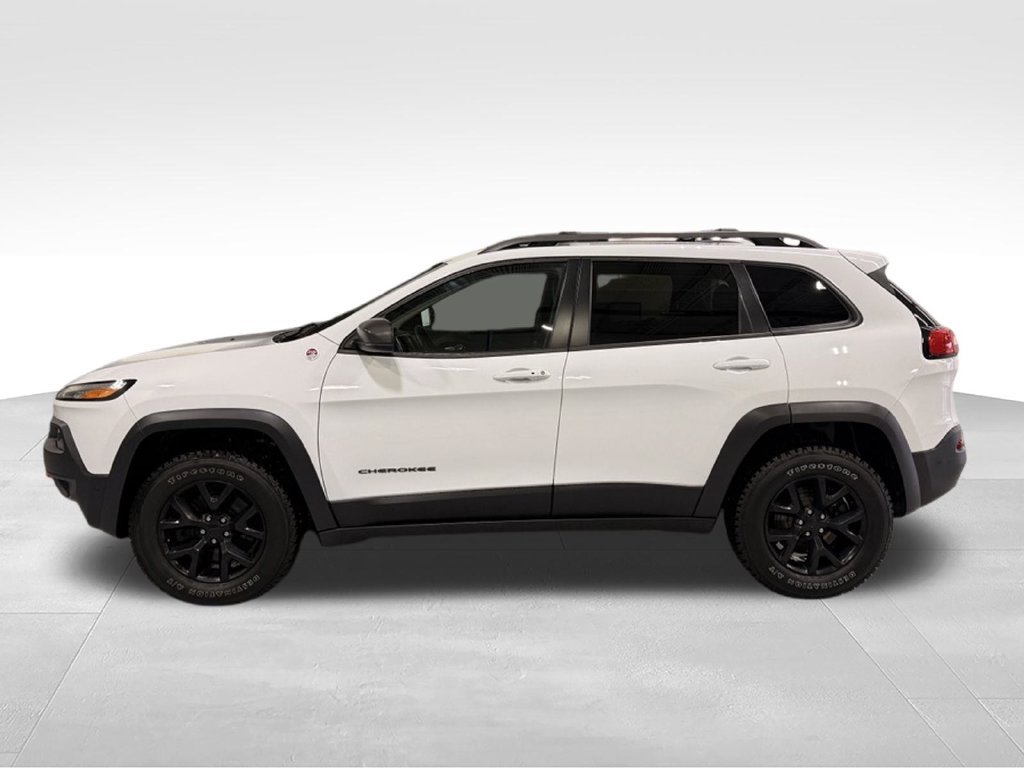 Used 2015 Jeep Cherokee Trailhawk with VIN 1C4PJMBSXFW614089 for sale in Golden Valley, Minnesota