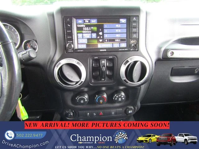 Used 2013 Red Jeep Unlimited Sahara image 14