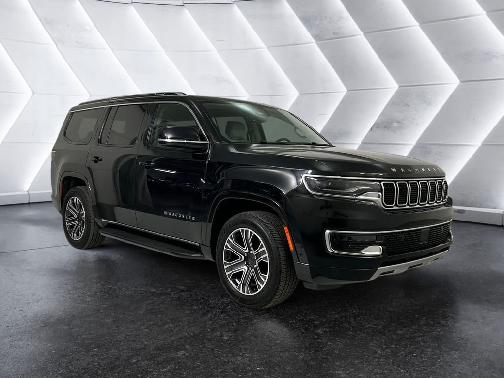 Used 2024 Black Jeep Series II image 1