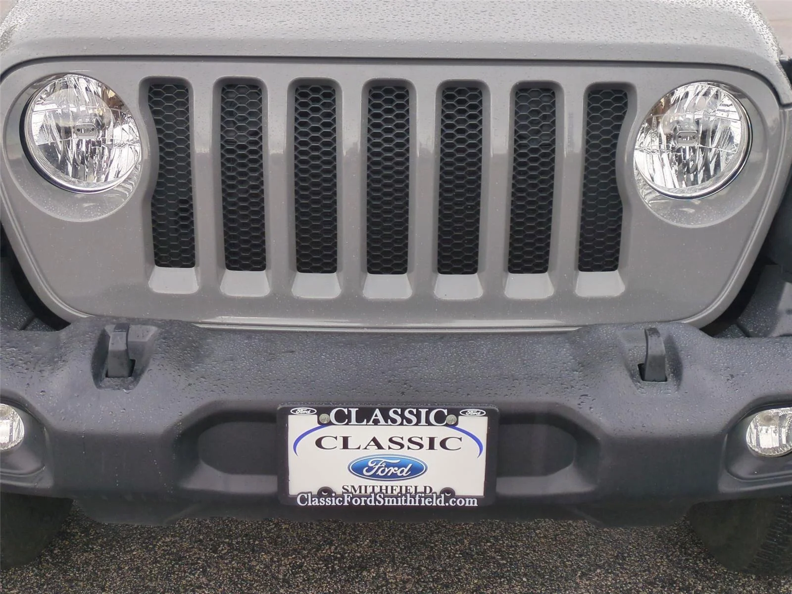 Used 2021 Granite Crystal Metallic Clearcoat Jeep Unlimited Sport S image 14