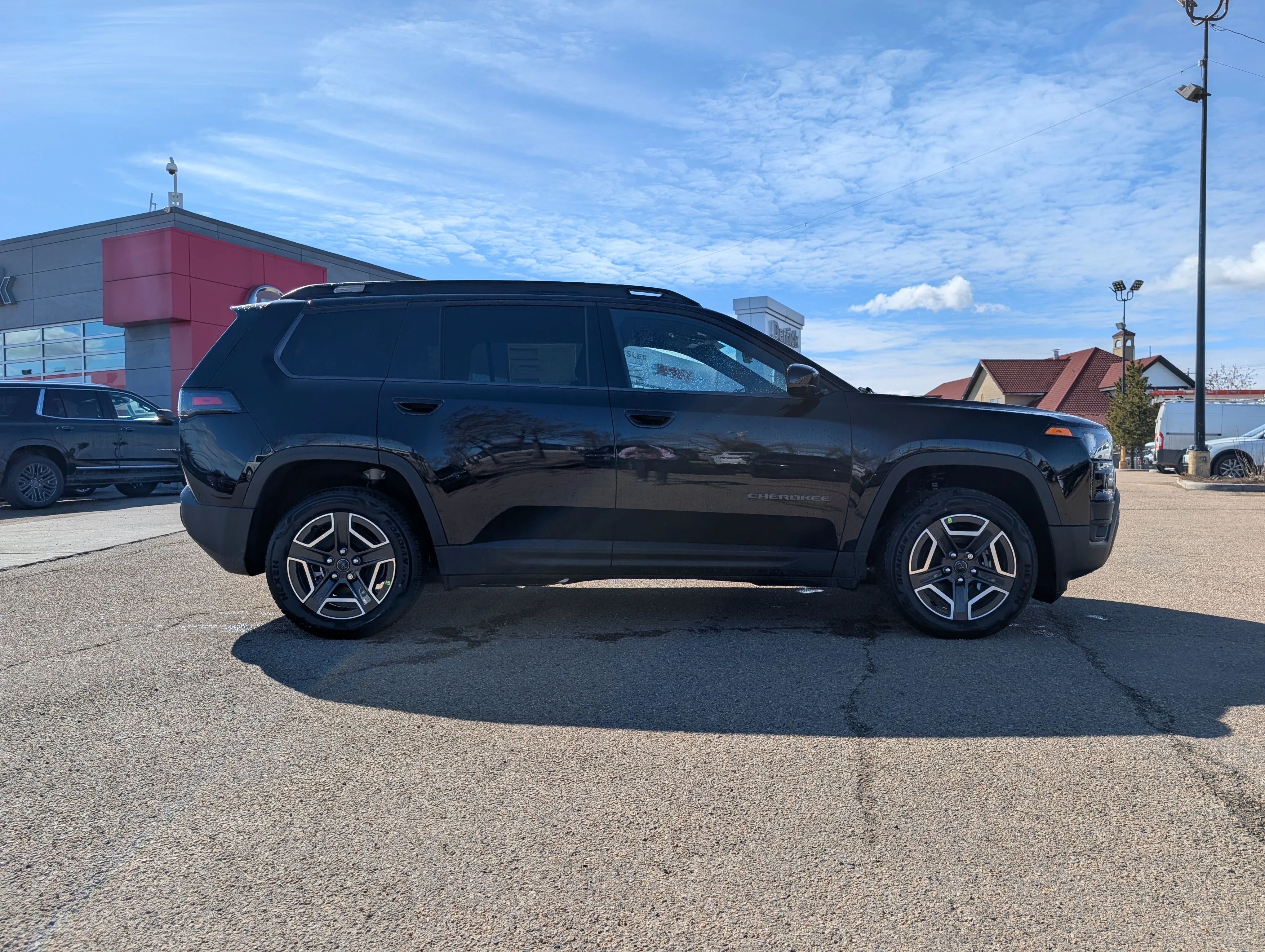 New 2026 Diamond Black Crystal Pearl Jeep Laredo image 8