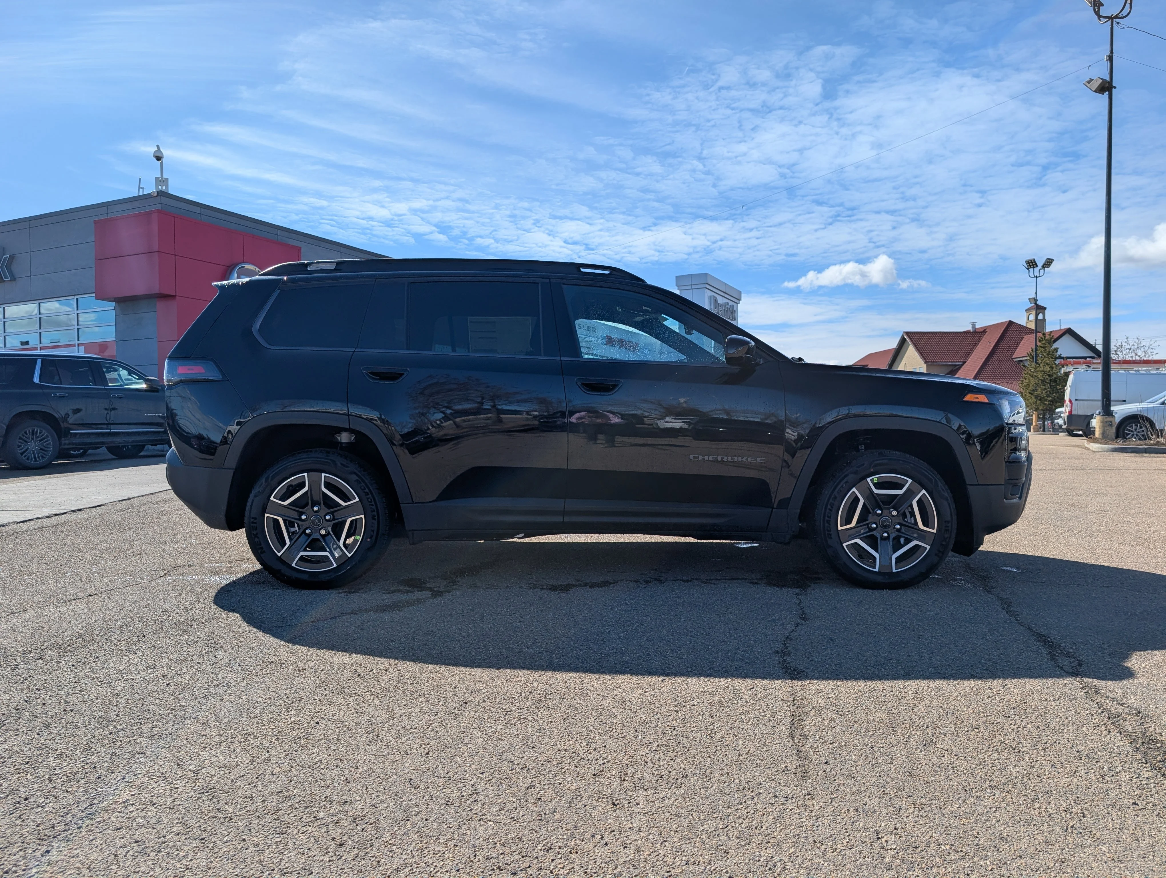 New 2026 Diamond Black Crystal Pearl Jeep Laredo image 8