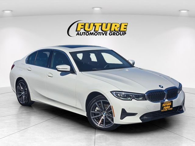 Used 2021 White BMW 330i xDrive image 1