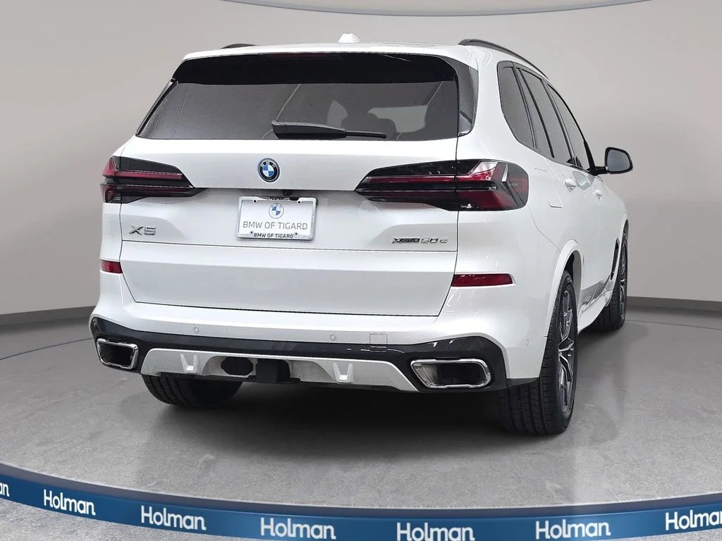 Used 2024 Mineral White Metallic BMW xDrive50e image 5