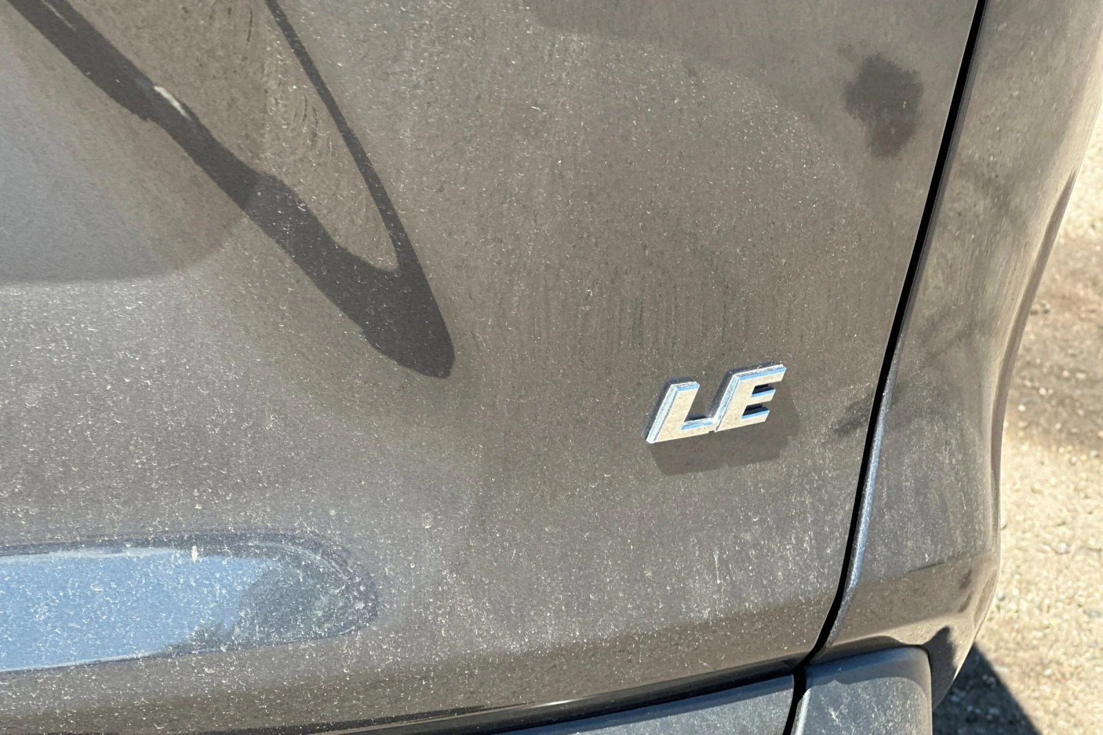 Used 2025 Magnetic Gray Metallic Toyota LE image 28