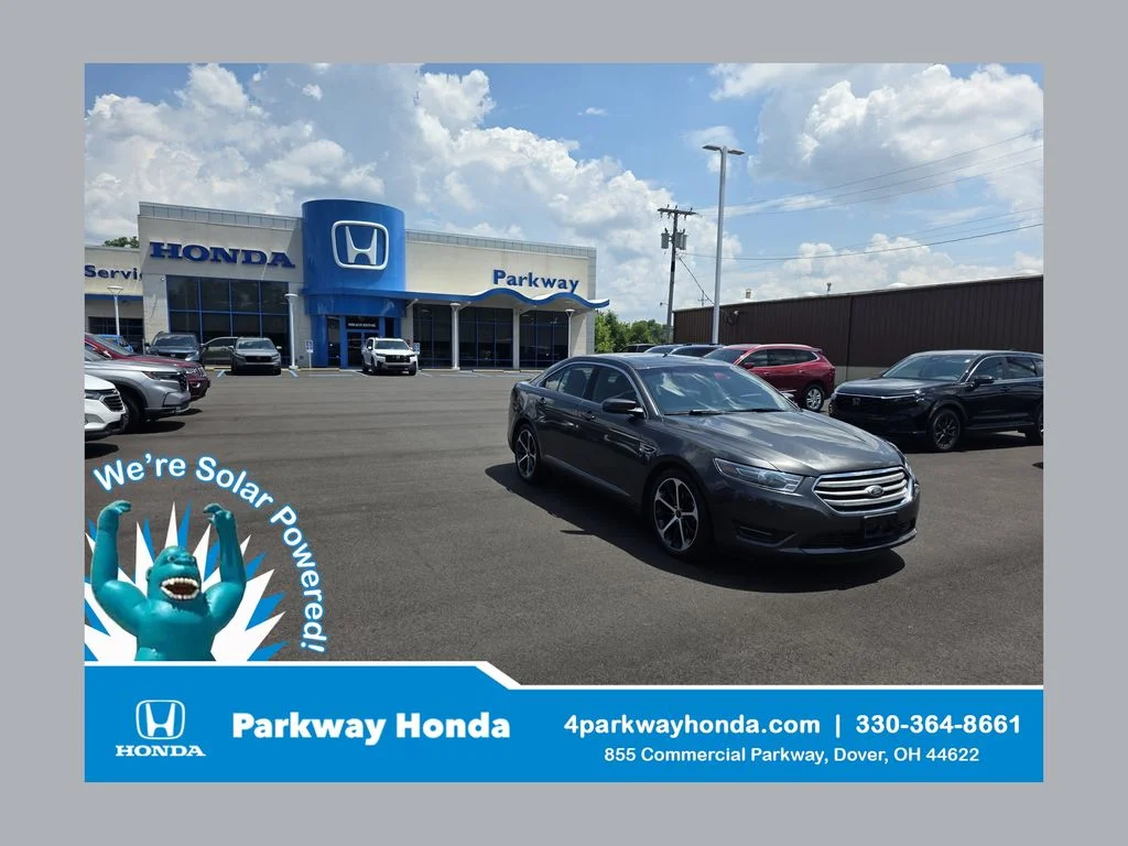 Used 2015 Magnetic Metallic Ford SEL image 1