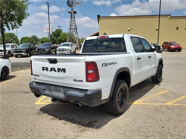 Used 2025 Bright White Clearcoat RAM Rebel 4x4 Crew Cab 144.5 in. WB image 4