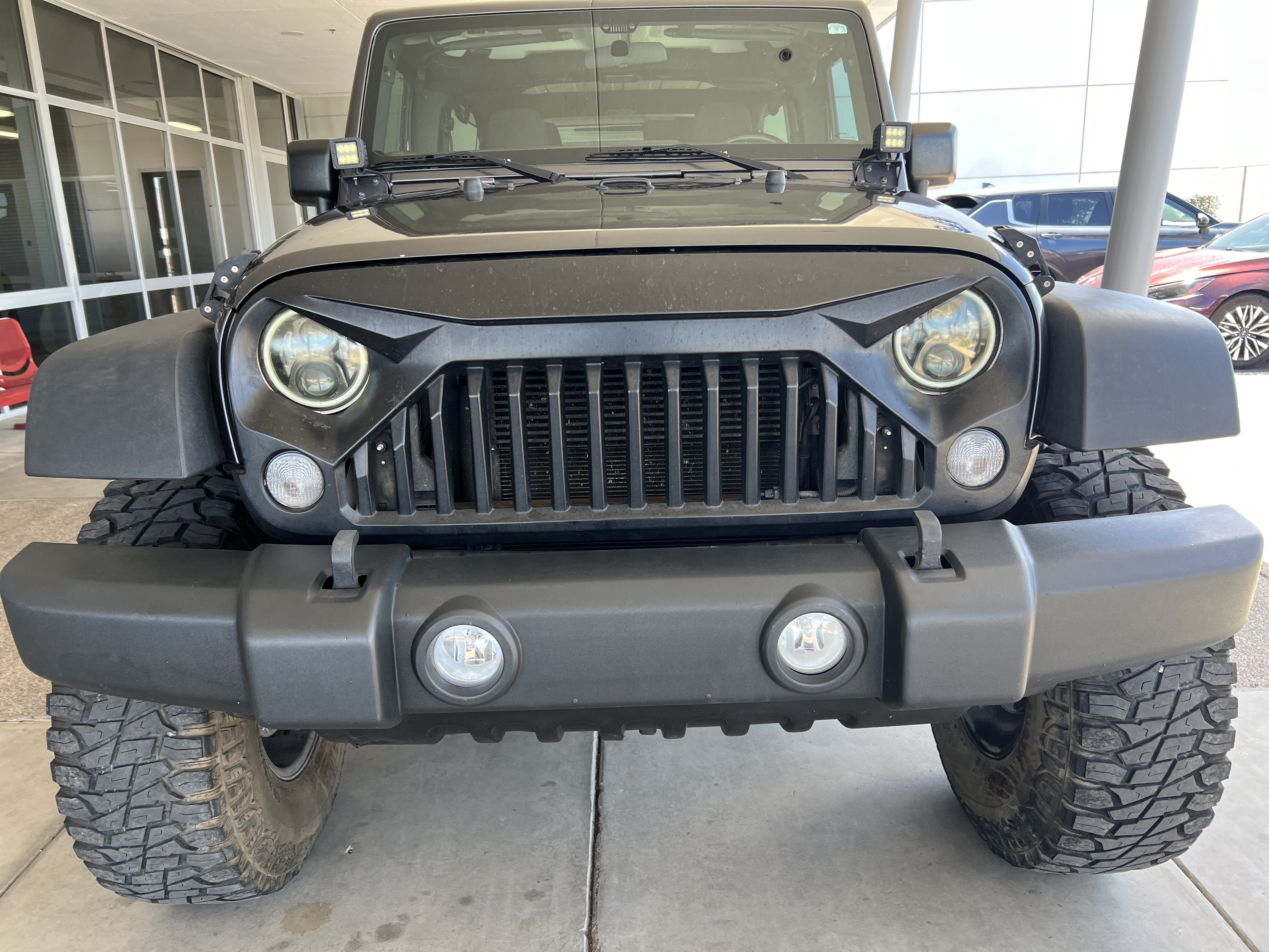 Used 2017 Gray Jeep Sport image 2