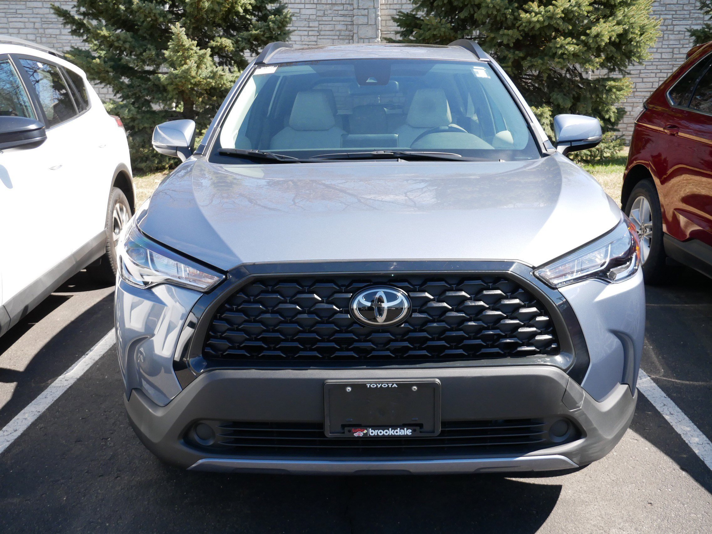 Certified 2022 Toyota Corolla Cross LE with VIN 7MUBAABG8NV043288 for sale in Brooklyn Center, Minnesota