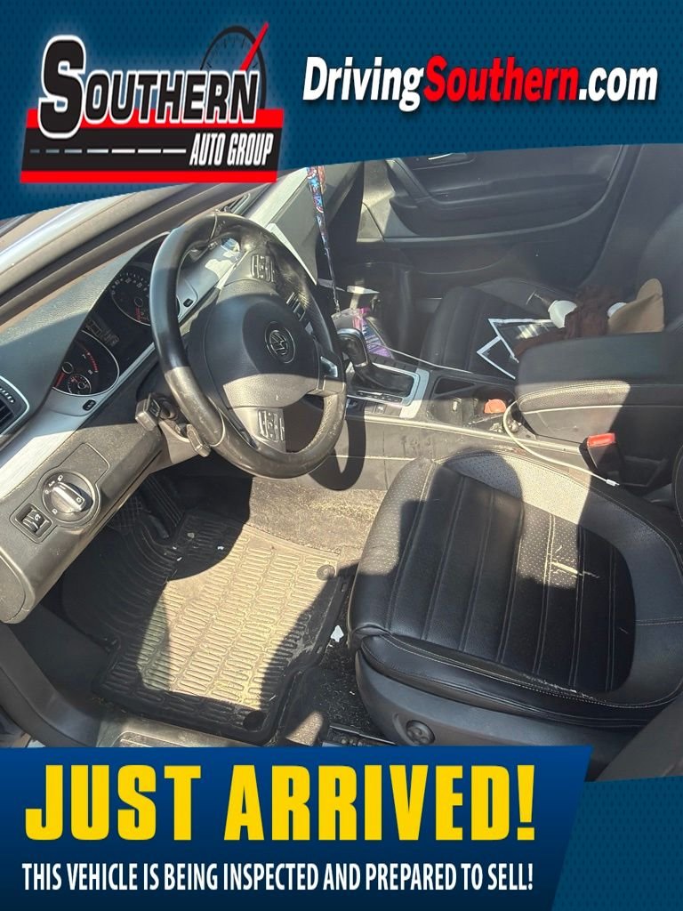 Used 2013 Black Volkswagen 2.0T Sport image 1