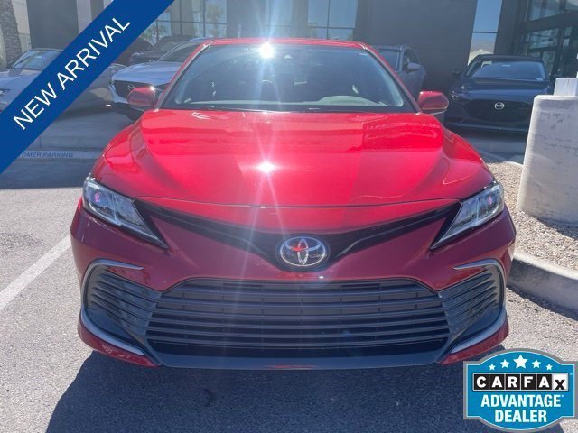 Used 2023 Supersonic Red Toyota LE image 2