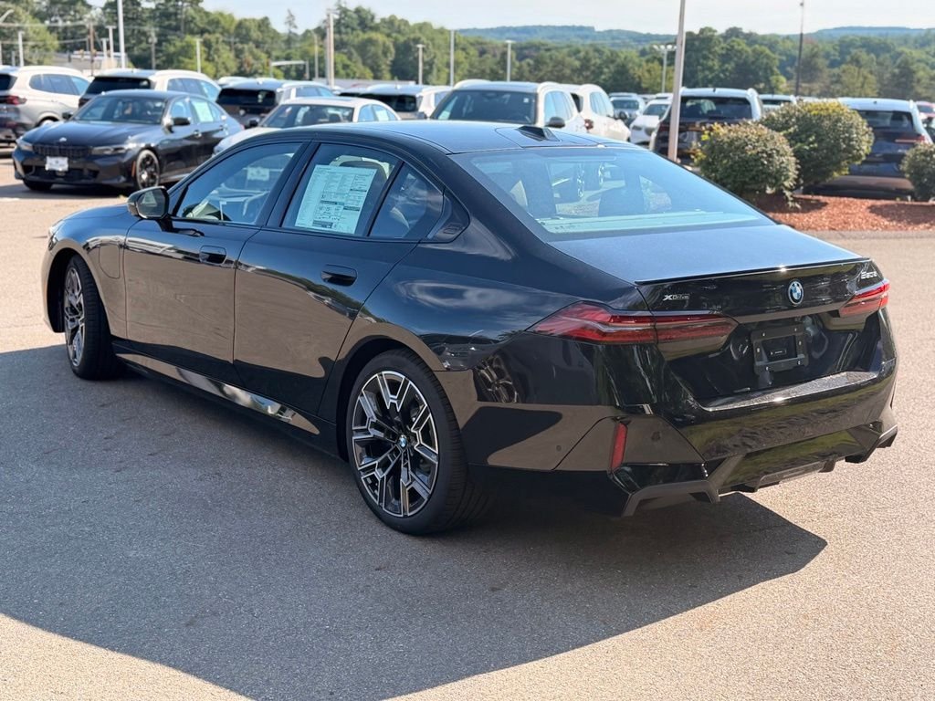 New 2027 Black Sapphire Metallic BMW 550e xDrive image 3