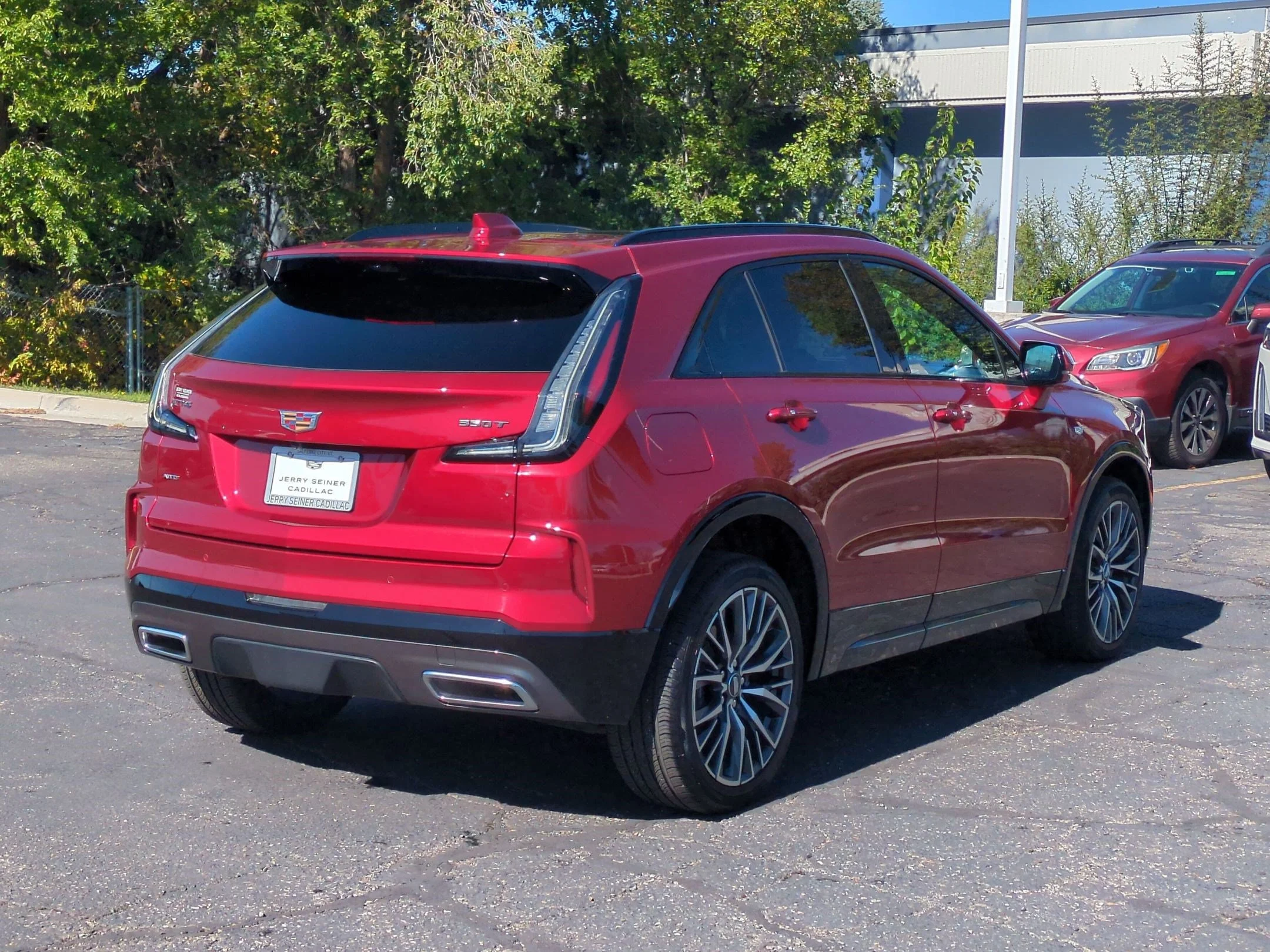 Used 2024 Radiant Red Tintcoat Cadillac AWD Sport image 5