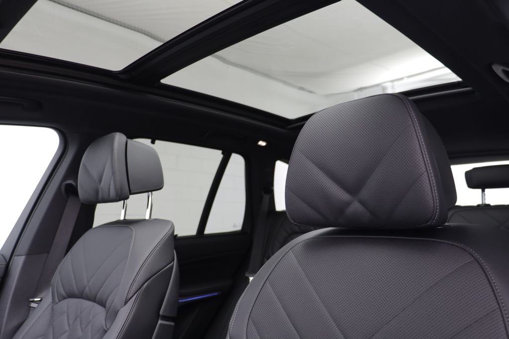 New 2026 Black Sapphire Metallic BMW xDrive50e image 14
