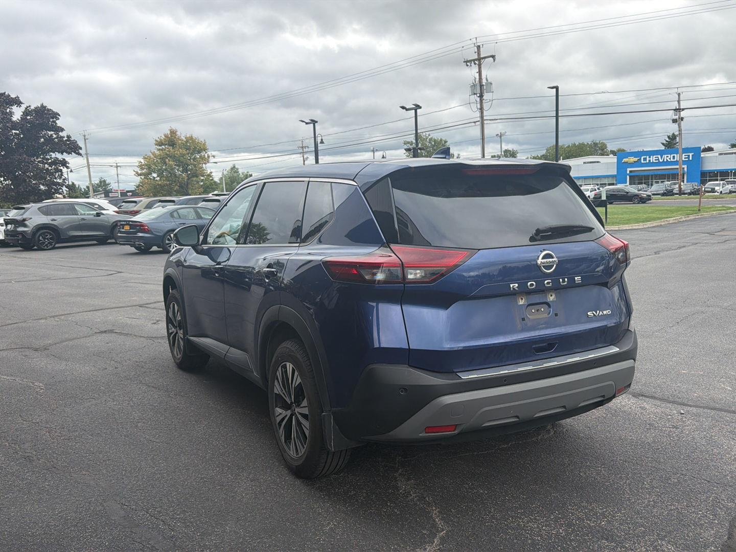 Used 2021 Caspian Blue Metallic Nissan SV image 6