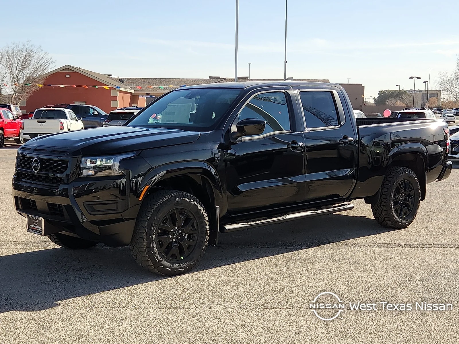 New 2026 KH3 Super Blac Nissan SV 4x2 Crew Cab 6 ft. box 139.8 in. WB image 1