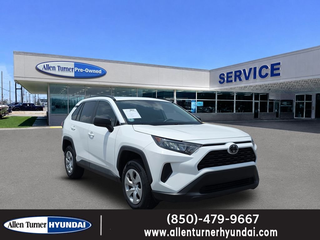 Used 2021 Super White Toyota LE image 1