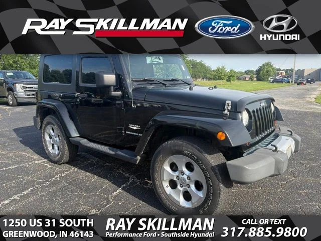 Used 2010 Black Jeep Sahara image 1