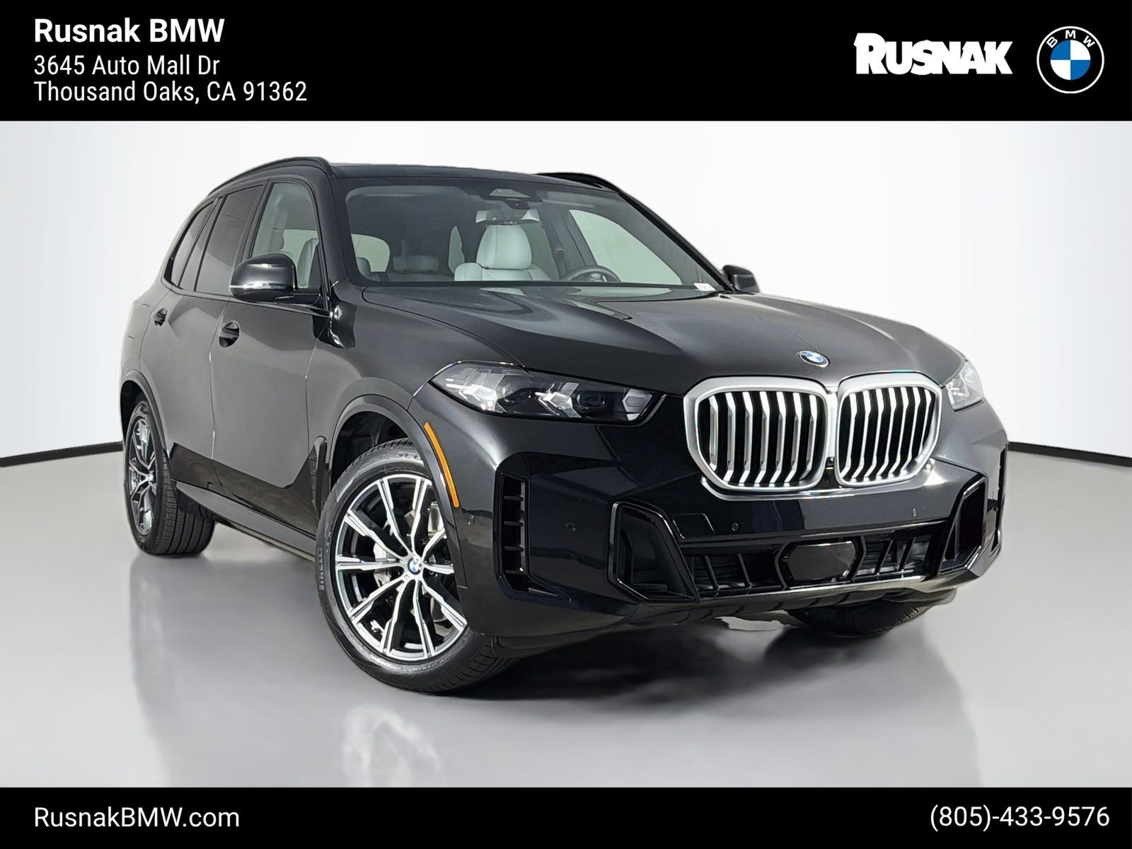 Certified Used 2024 Black Sapphire Metallic BMW xDrive40i image 1