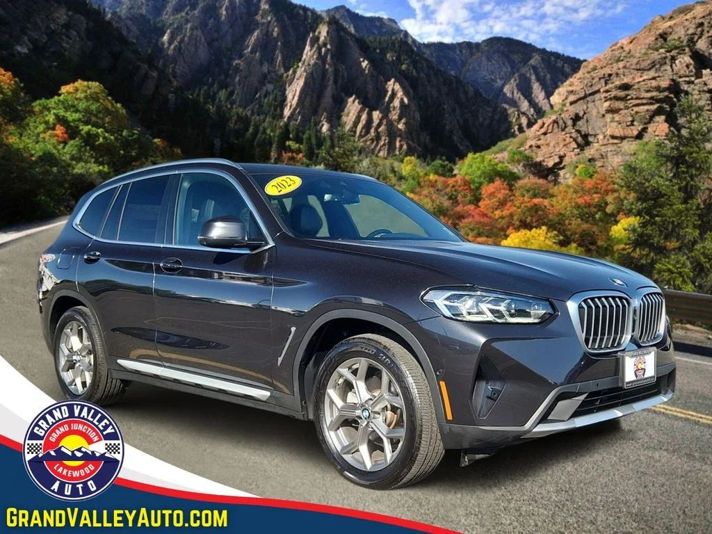 Used 2023 Black BMW xDrive30i image 1