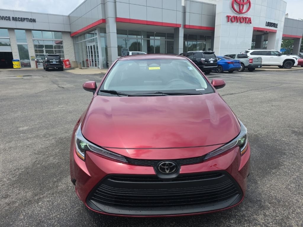 Certified Used 2025 Red Toyota LE image 2